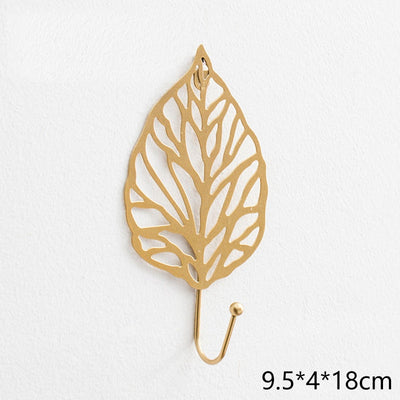 ganchos para abrigo hoja de arbol